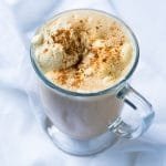 Paleo & keto pumpkin spice latte in a glass mug with whipped cream