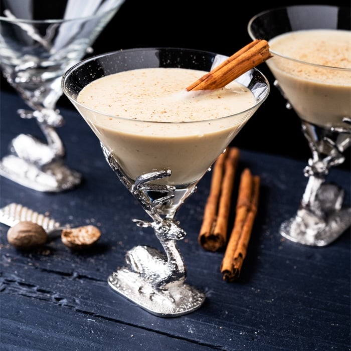 Homemade paleo and keto eggnog in Christmas glasses