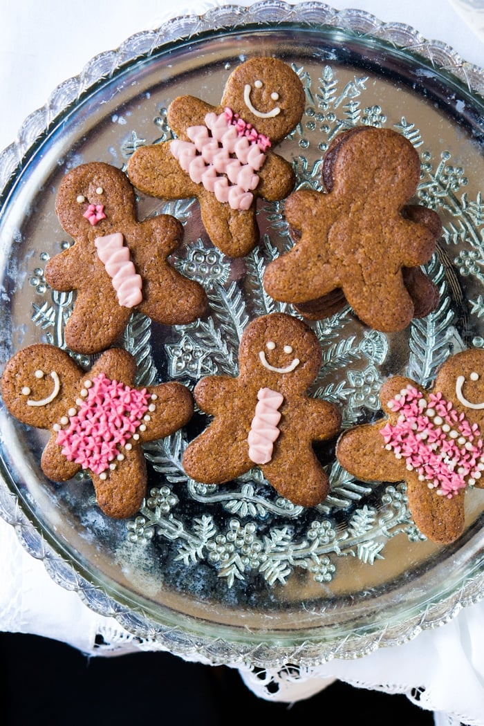 Decorating keto gingerbread cookies with icing