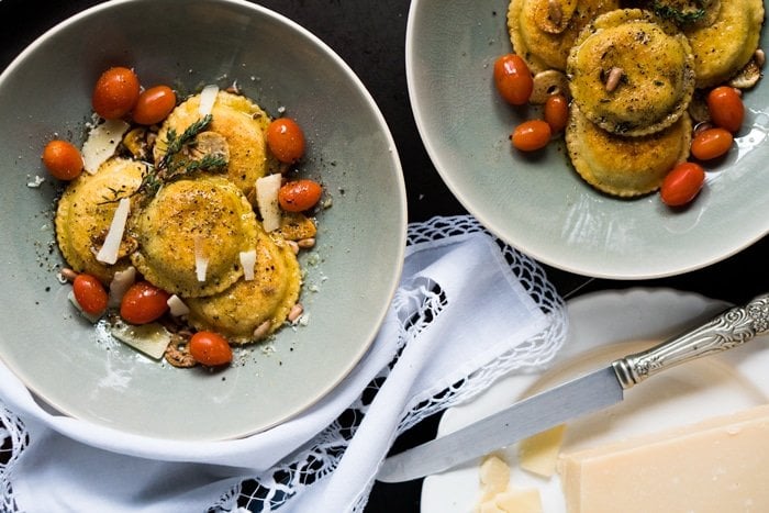 Two plates with pillowy-soft keto ravioli
