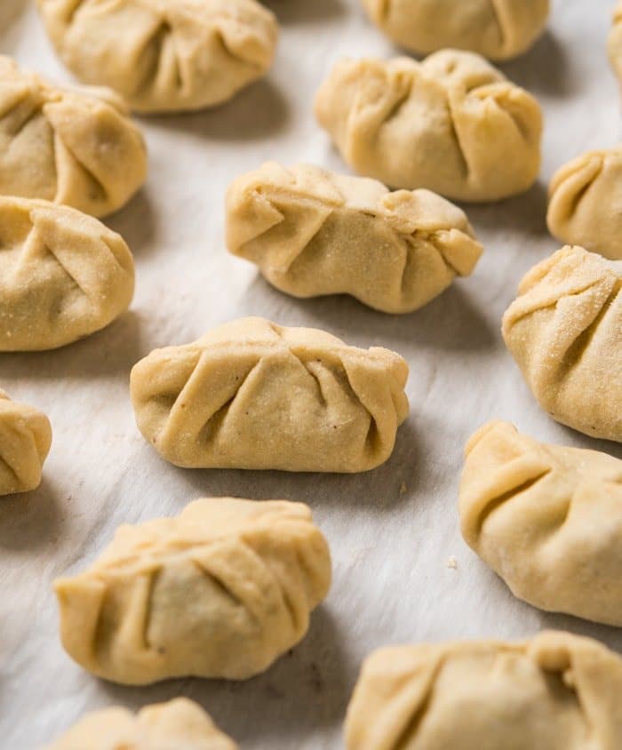 Freshly shaped Keto dumplings on a baking tray