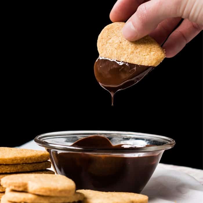 Dunking Keto Shortbread Cookies in Chocolate