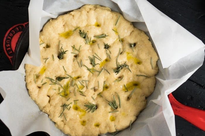 Keto focaccia dough after rise in a skillet