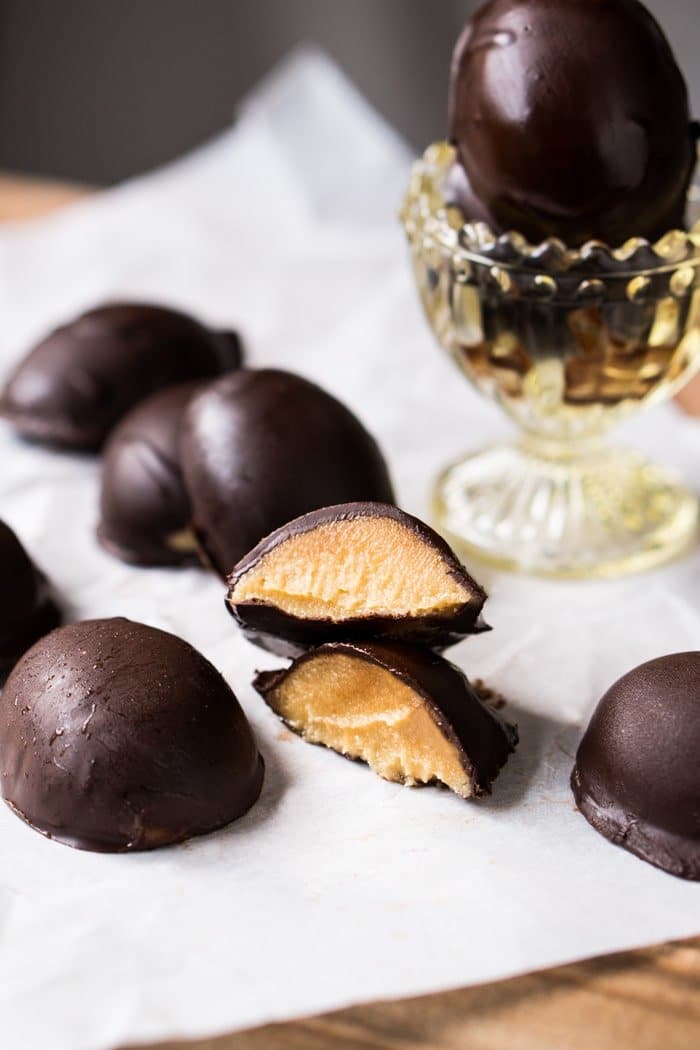 A halved keto chocolate Easter egg showing its creamy peanut butter filling