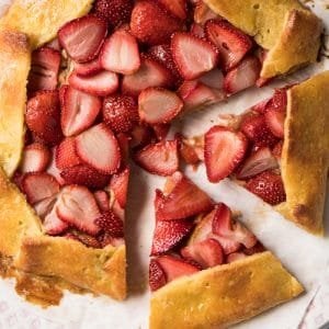 Sliced up keto strawberry galette with pie crust