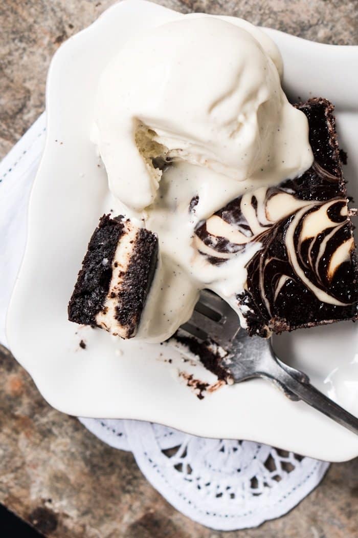 Eating a keto cheesecake brownie with a fork