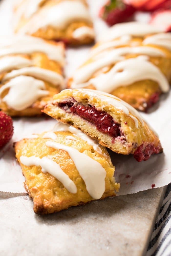 A halved keto pop tart showing the strawberry filling