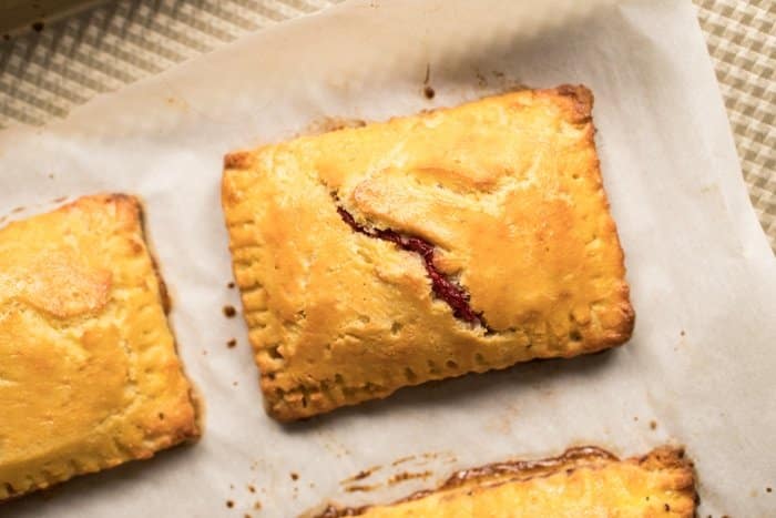 Freshly baked keto pop tart on a golden baking tray