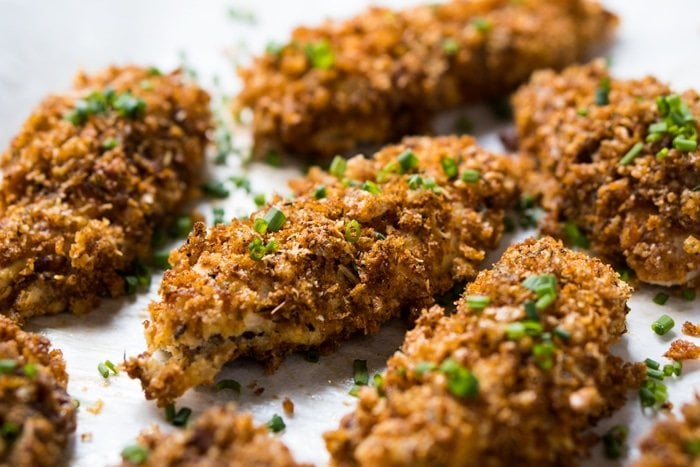 Freshly baked keto chicken tenders with chives