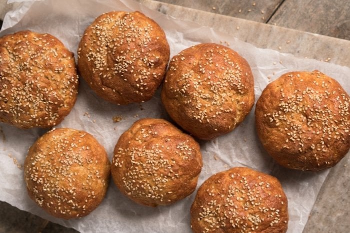 Freshly baked keto burger buns with sesame seeds