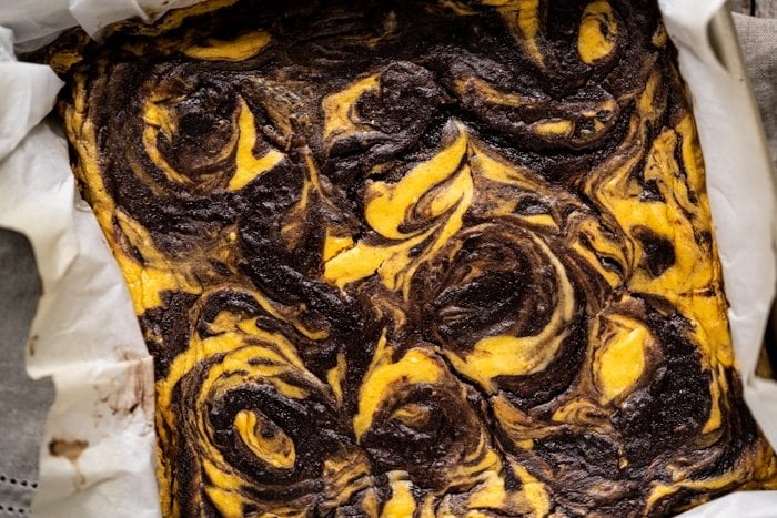 Freshly baked low carb pumpkin cheesecake brownies