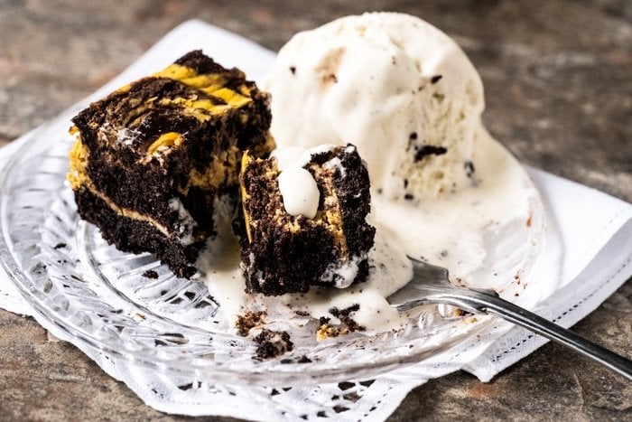 Melting vanilla ice cream with low carb pumpkin cheesecake brownies