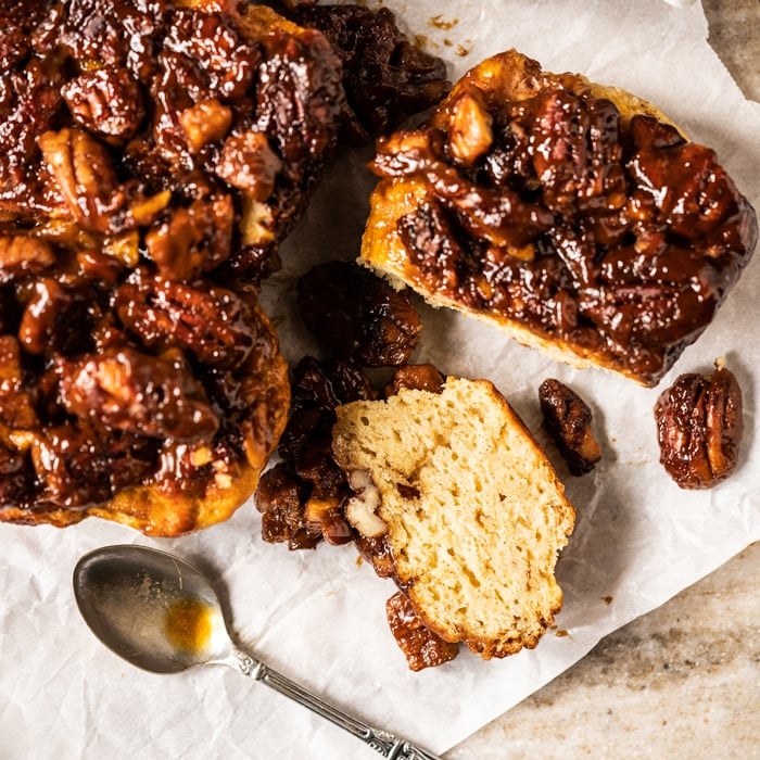 Gluten free & keto pecan sticky buns on a marble surface