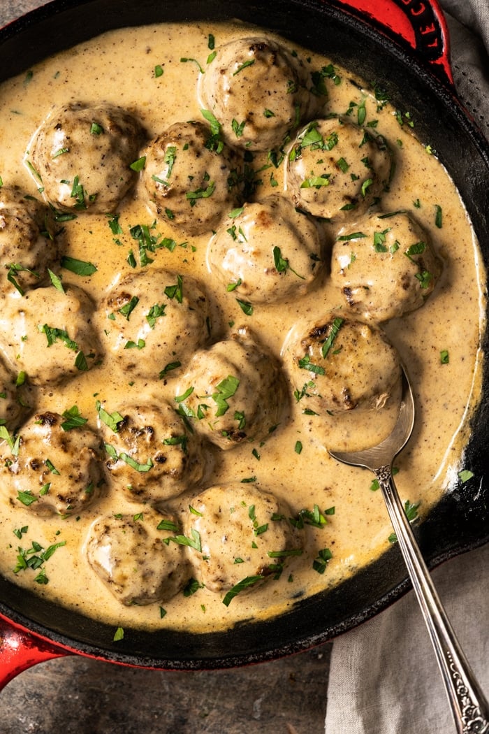 Traditional gluten free & keto Swedish meatballs in a cast iron pan