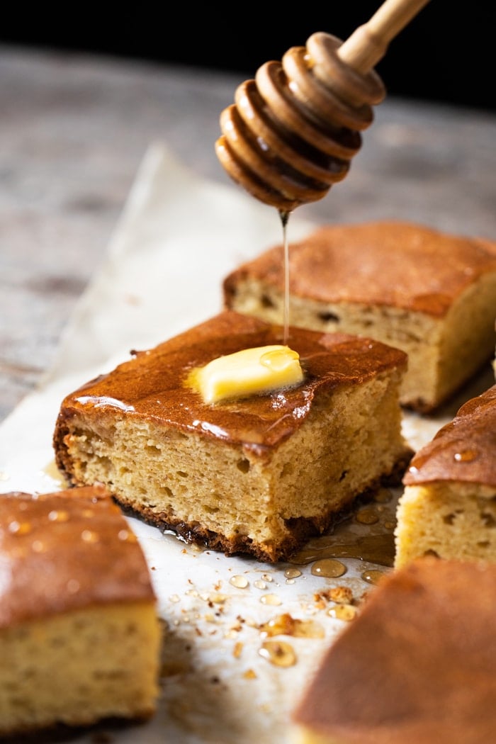 Keto cornbread slice with a dollop of butter