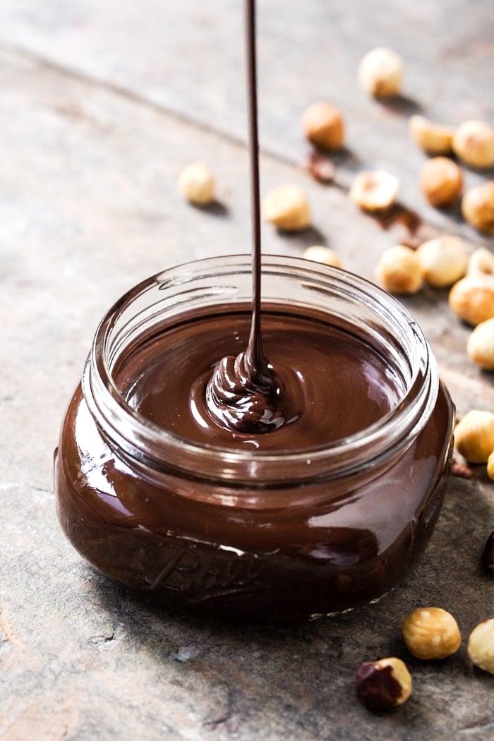 Pouring paleo & keto nutella hazelnut spread 