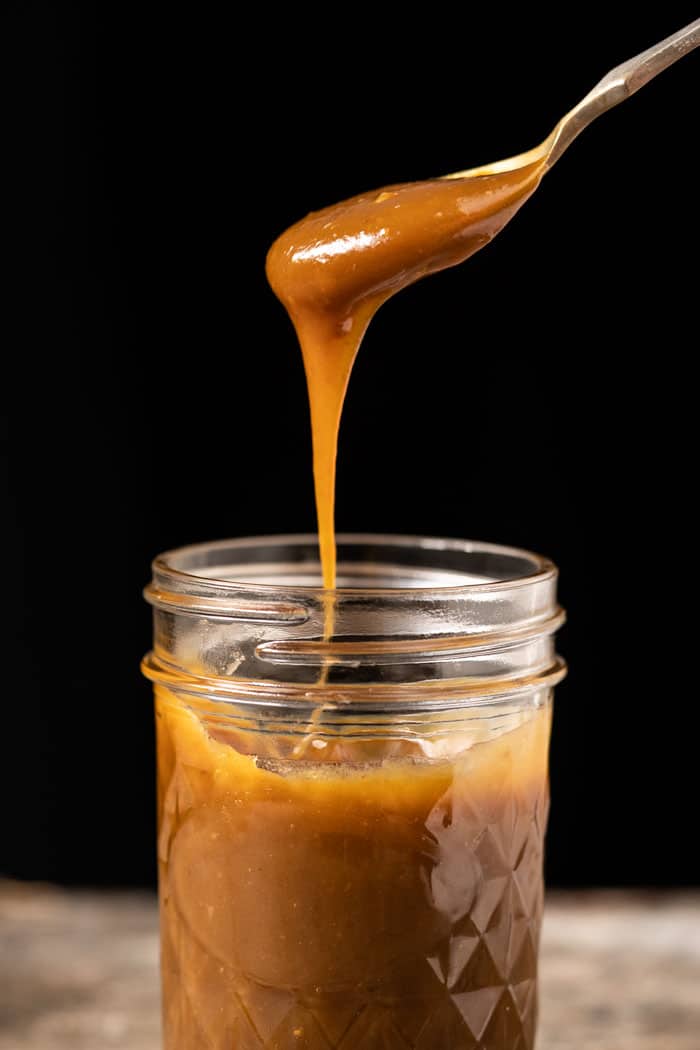 A spoonful of sugar free and keto caramel sauce