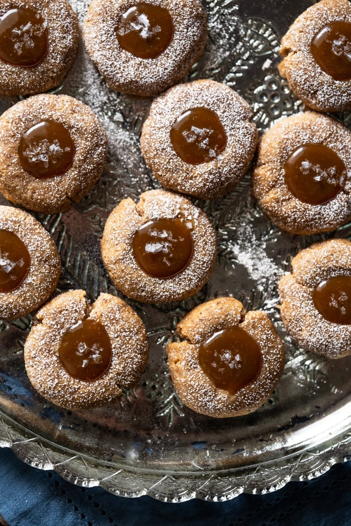 Gluten free & keto salted caramel thumbprint cookies with flakey sea salt