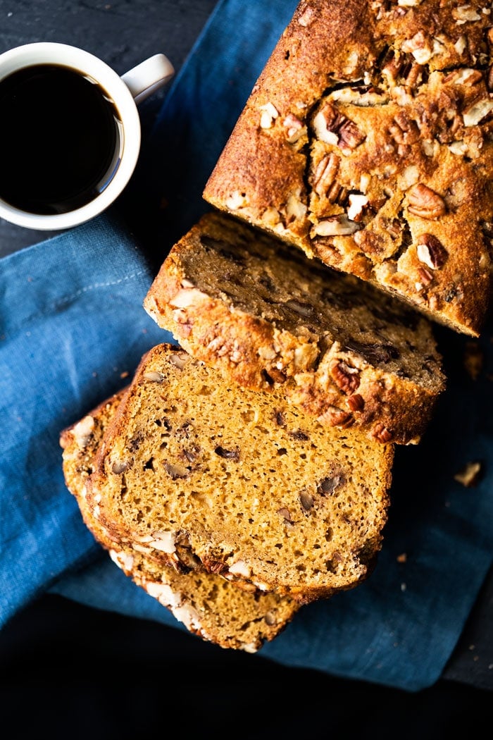Freshly sliced keto banana bread with coffee