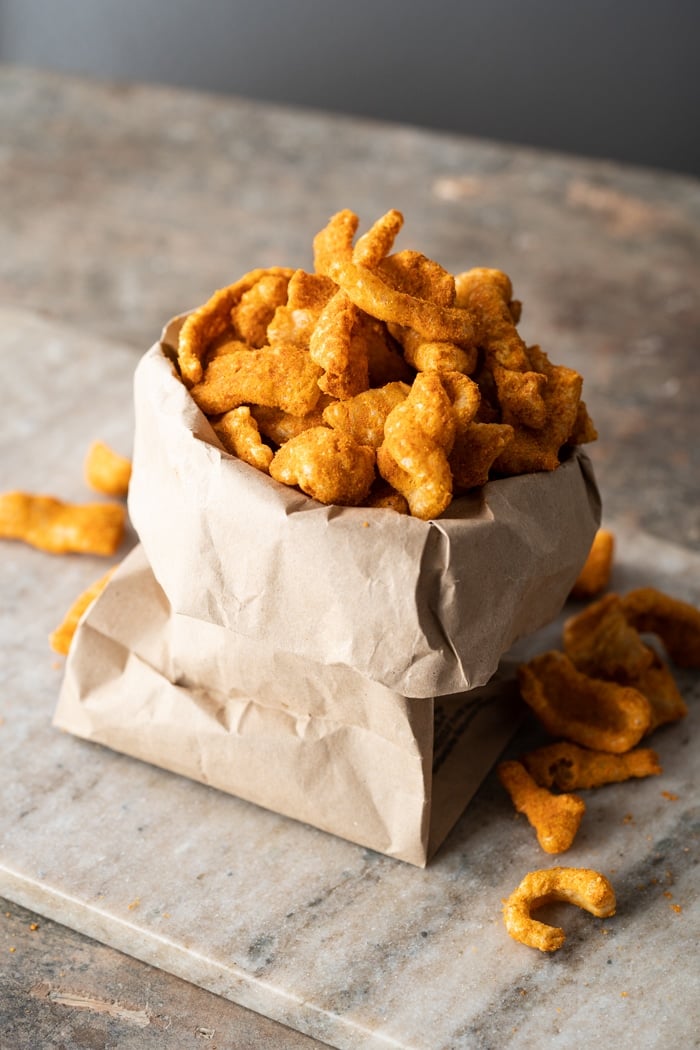 Keto cheetos in a brown paper bag