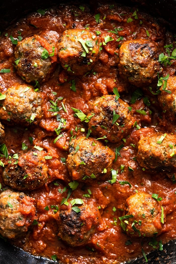 Closeup keto meatballs in a skillet