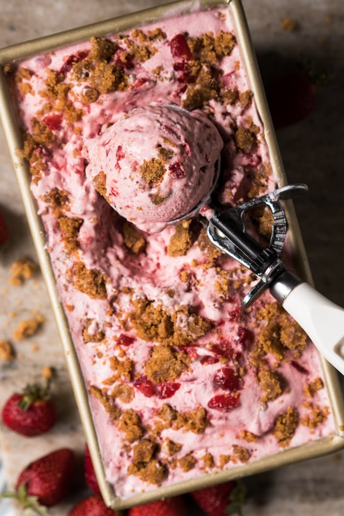 Serving keto strawberry cheesecake ice cream