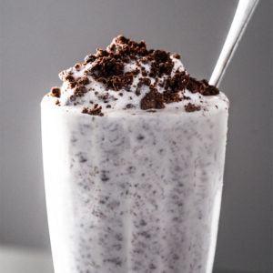 Keto cookies cream milkshake with extra 'Oreo crumbs' on top