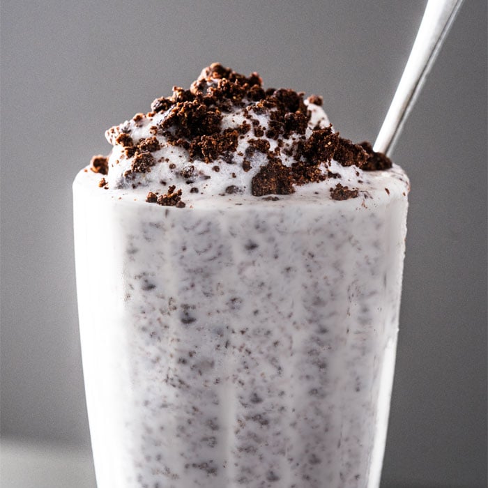 Keto cookies cream milkshake with extra 'Oreo crumbs' on top