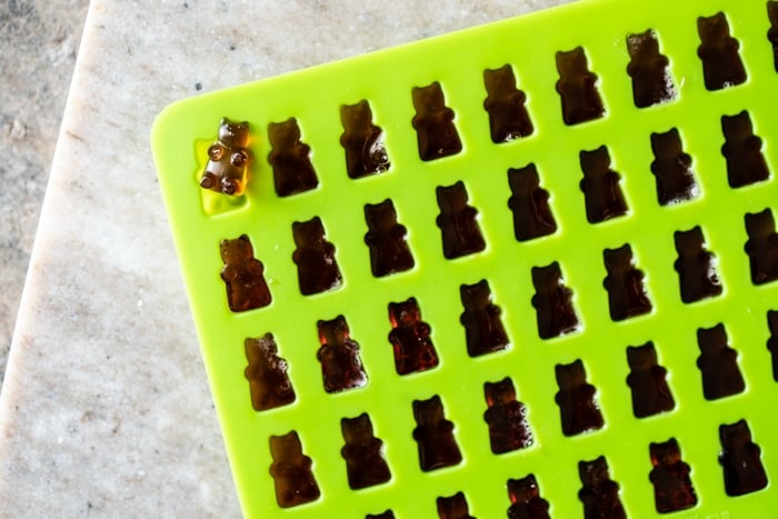 Keto gummies in a green silicon bear mold