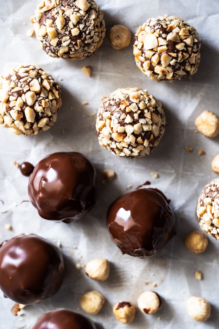 Coating homemade hazelnut truffles in chocolate