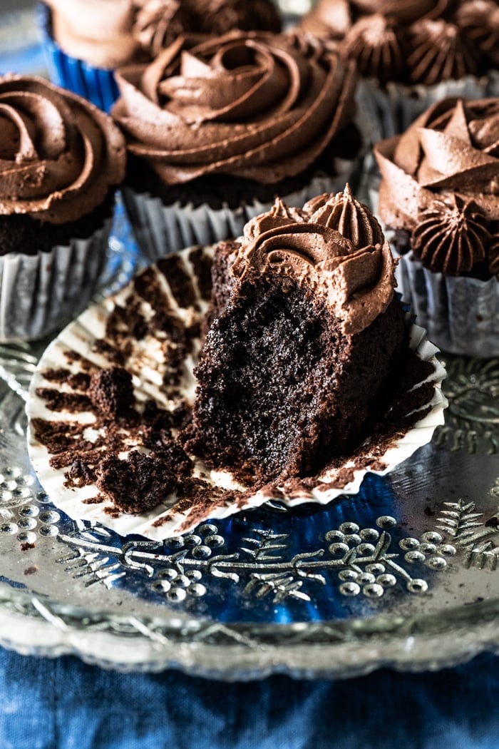 A remaining piece of a fudgy gluten free chocolate cupcake