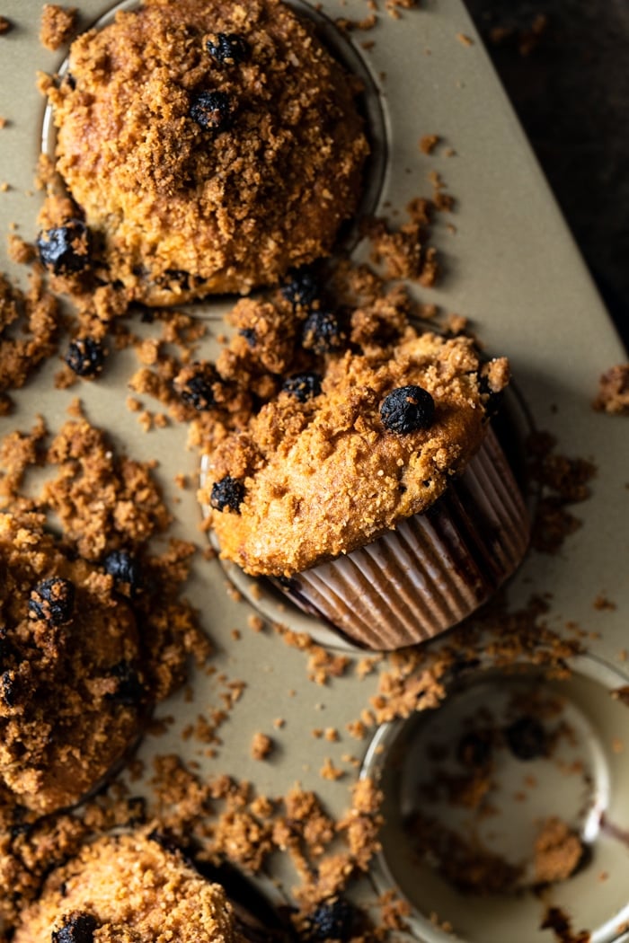 Freshly baked Keto Blueberry muffins in golden tray