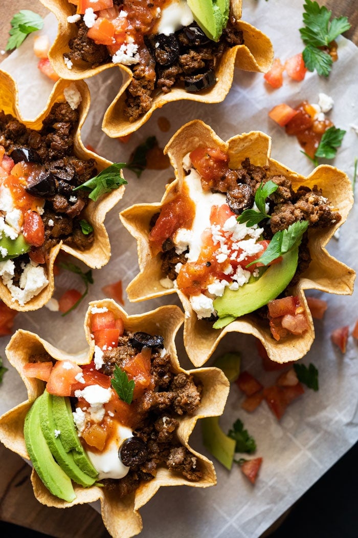 Keto taco bowls with sour cream, salsa and avocado