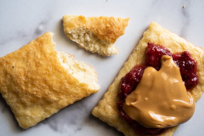 Keto flatbread slices with peanut butter and jelly