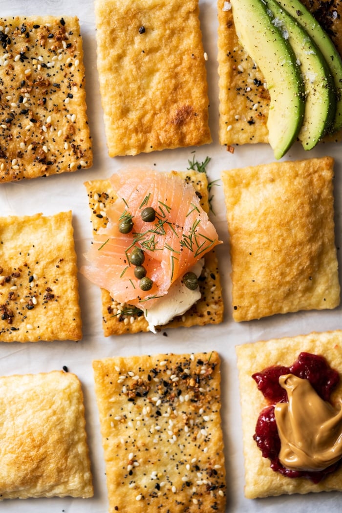 Keto flatbread with toppings: salmon, peanut butter and avocado