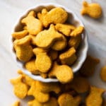 Homemade keto goldfish crackers in a white serving bowl