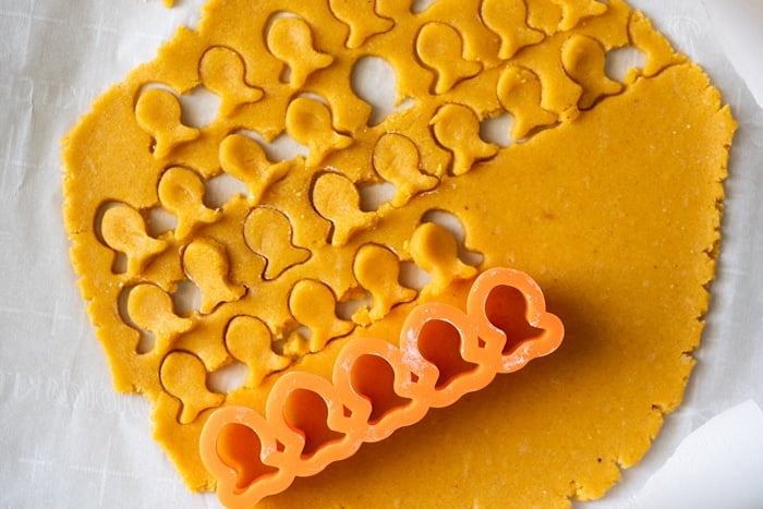 Cutting out goldfish with cookie cutter