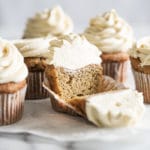 Keto vanilla cupcake with buttercream frosting over marble surface