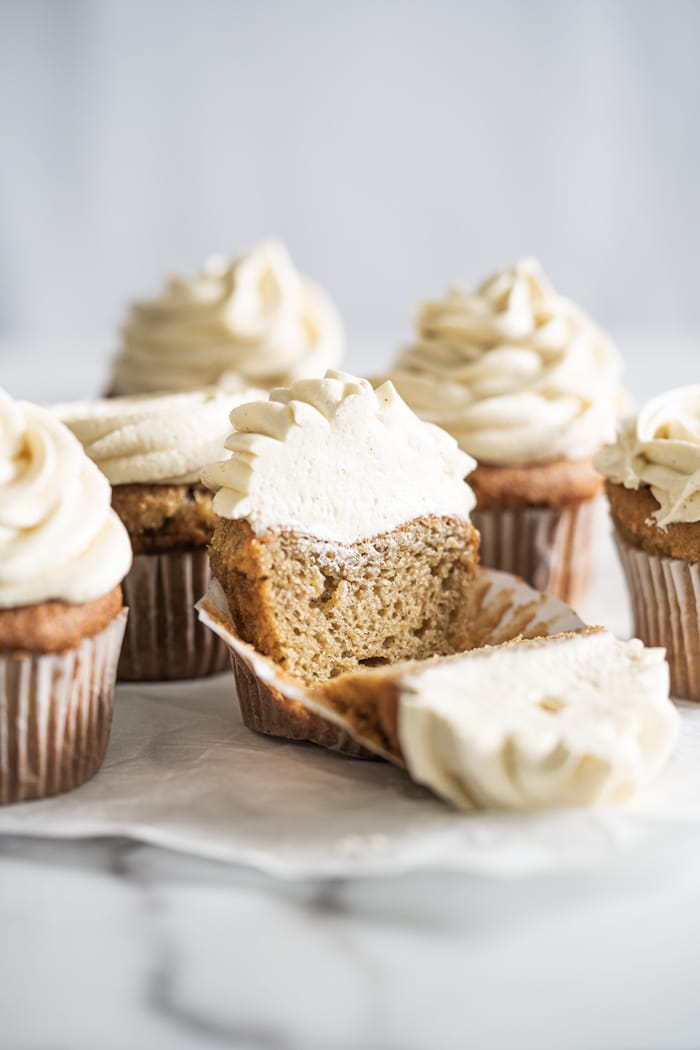 Keto vanilla cupcake with buttercream frosting over marble surface