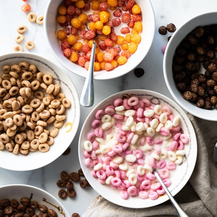 Bowls of store bought keto cereal with various flavors