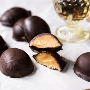 A halved keto chocolate Easter egg showing its creamy peanut butter filling