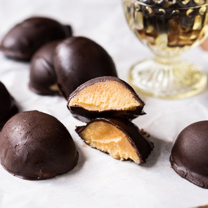 A halved keto chocolate Easter egg showing its creamy peanut butter filling