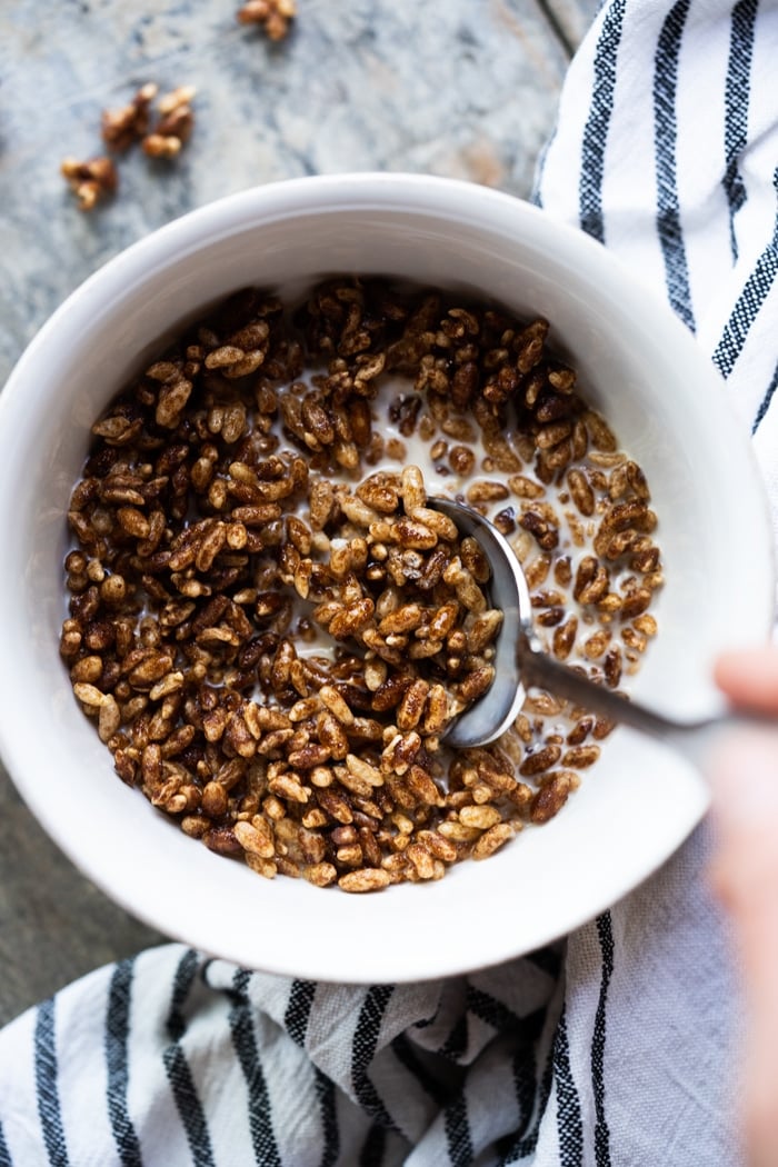 Taking a spoonful of chocolate High Key Keto Cereal