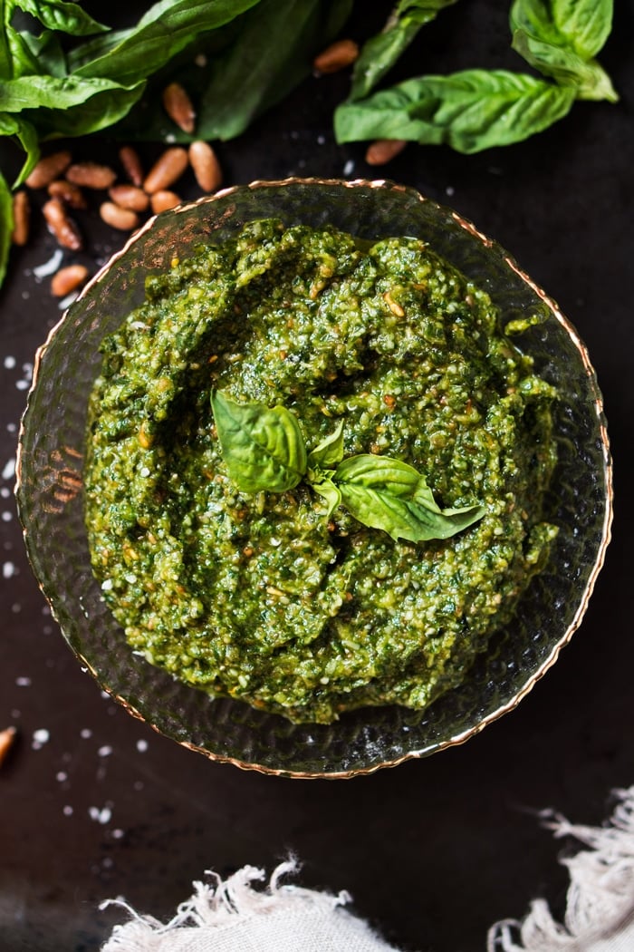 Overhead shot Keto pesto with fresh basil and pine nuts