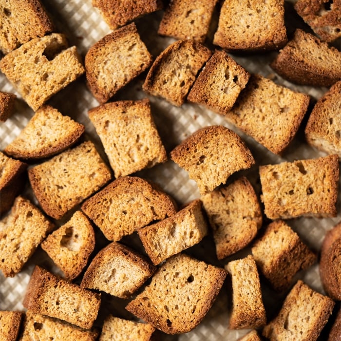 Freshly baked grain free & keto croutons on a baking tray