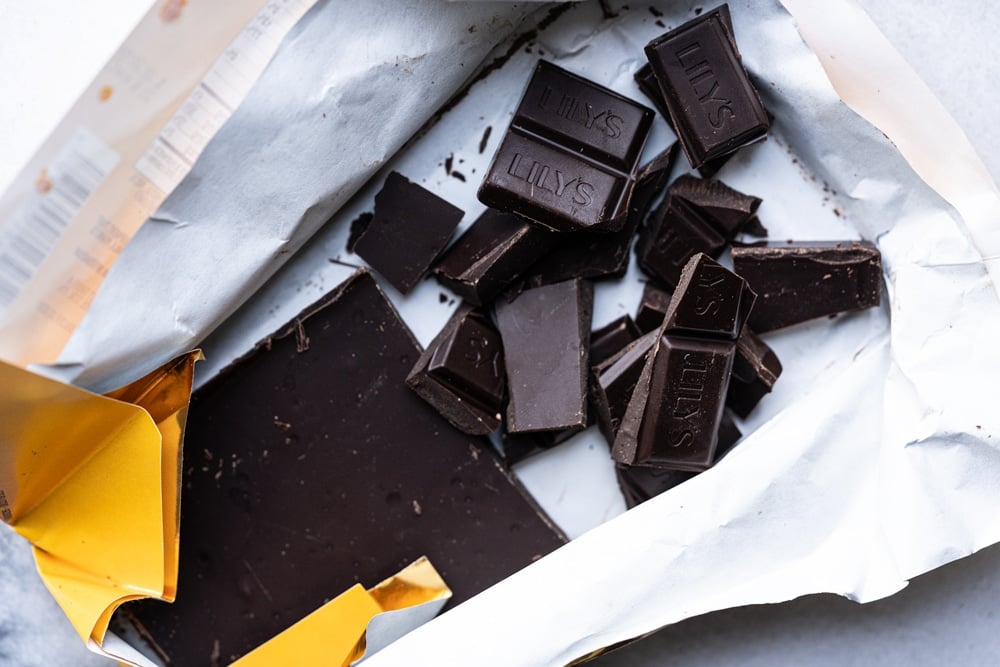 A broken up Lily's keto dark chocolate bar