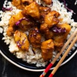 Keto orange chicken with sticky sauce served with cauliflower rice