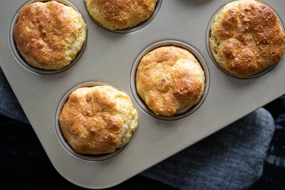 Overhead shot of low carb cornbread just baked in a muffin tin