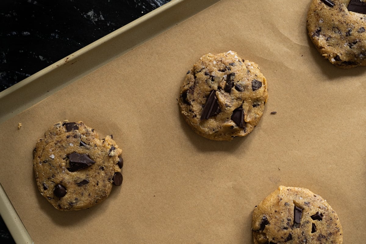 Unbaked keto chocolate chip cookies on a baking tray