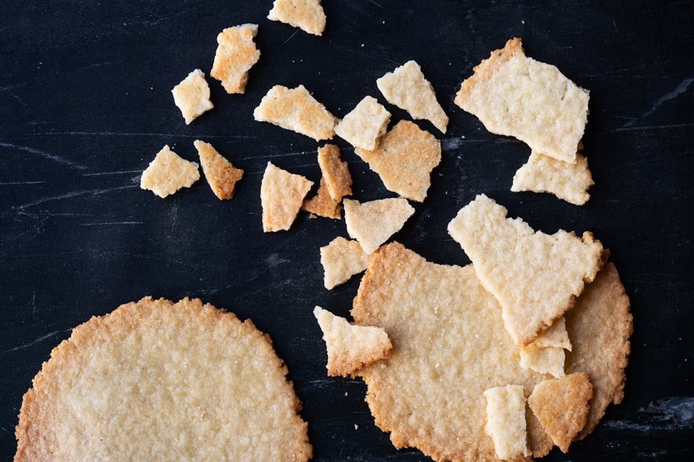 Breaking apart the keto cereal to get flakes